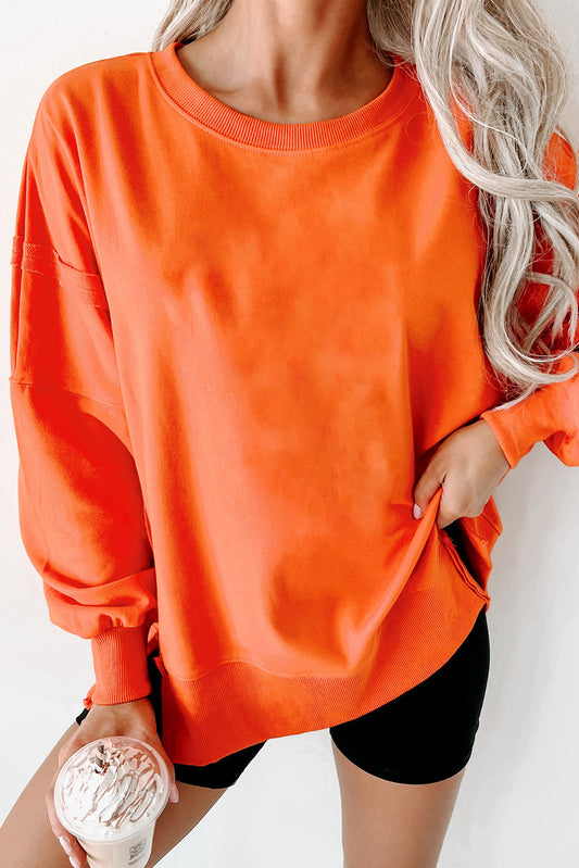 Carrot Exposed Seam Drop Shoulder Round Neck Sweatshirt with Slits