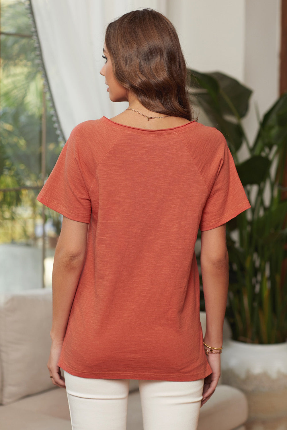 Orange V Neck Short Sleeves Cotton Blend Tee with Front Pocket and Side Slits